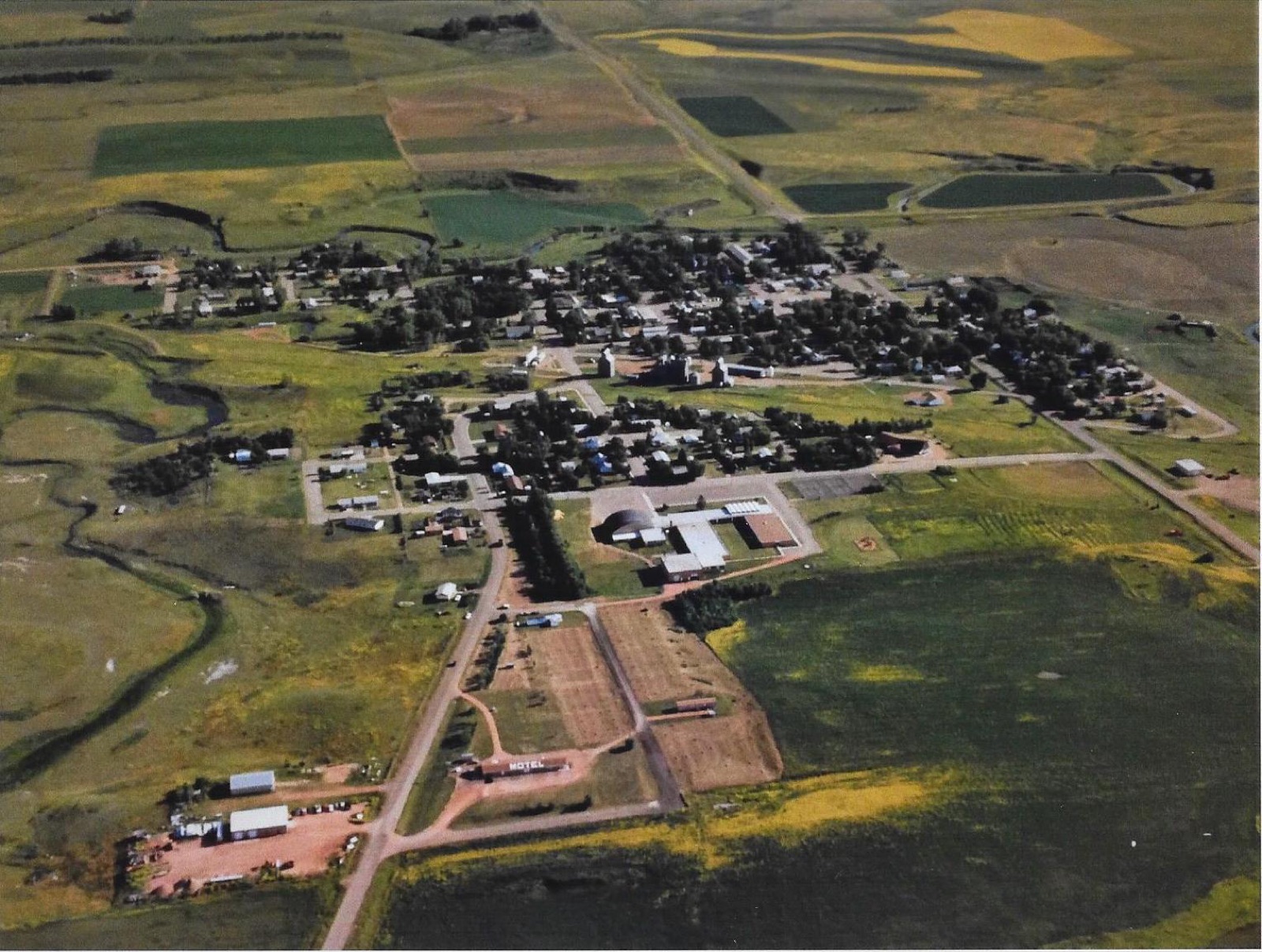 Aerial photograph of the City of Halliday surrounded by North Dakota prairie