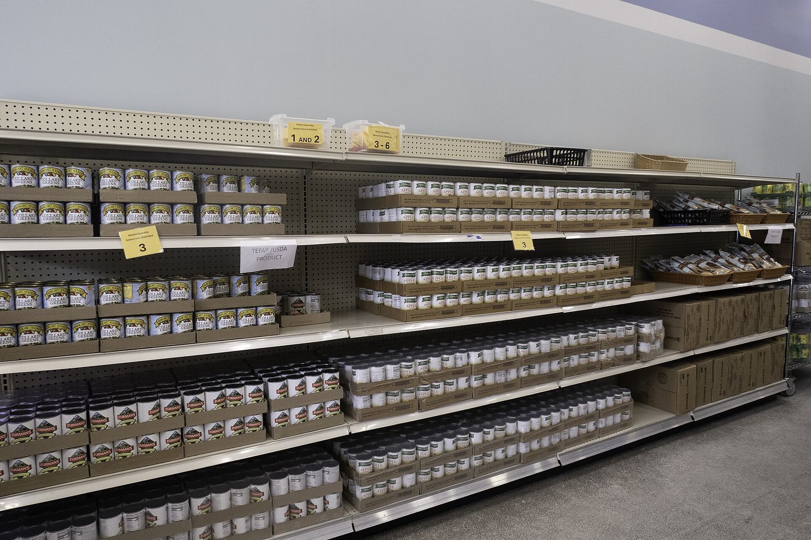 Shelves stocked with canned food