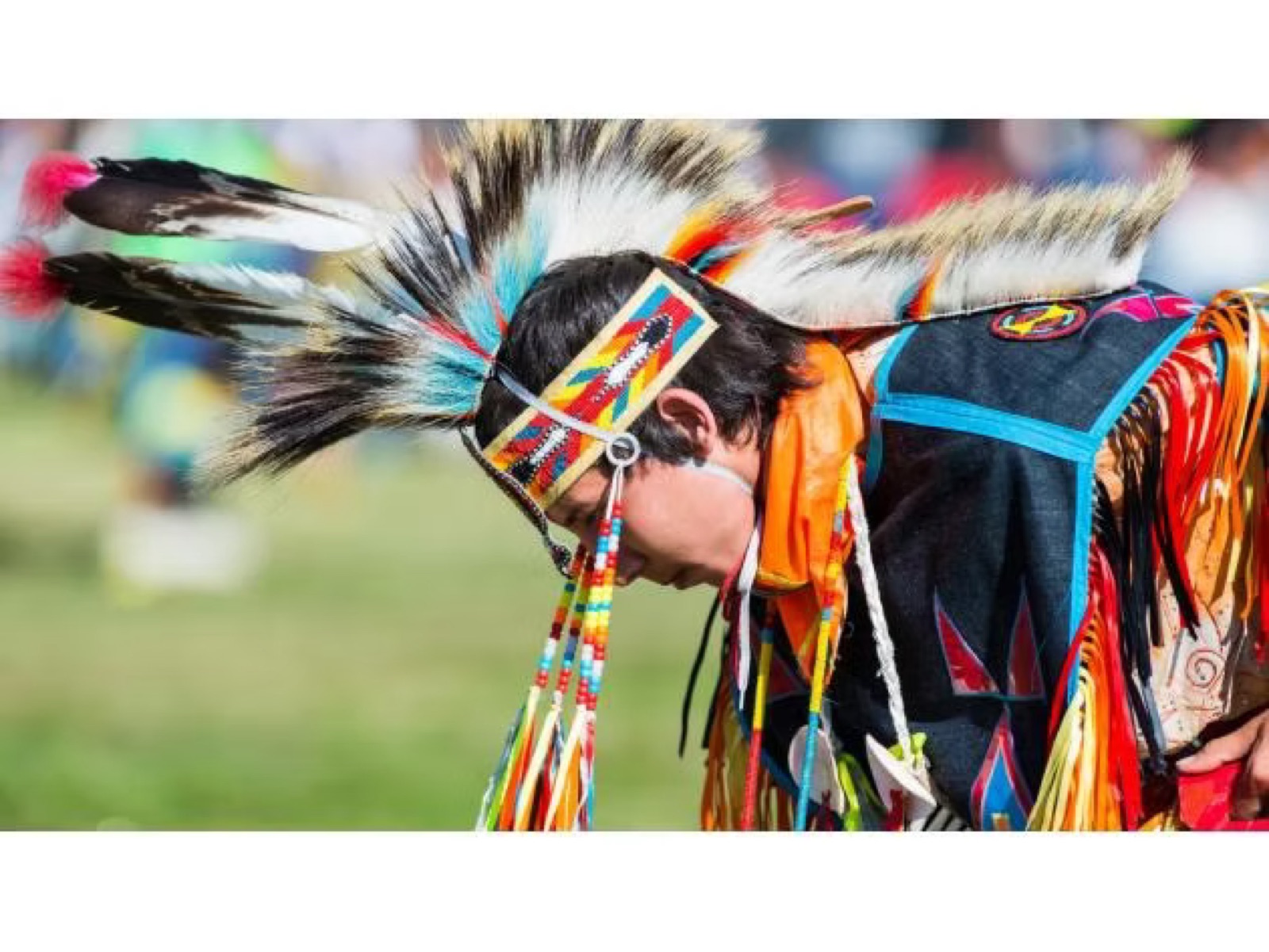 Dancer in regalia at a local powwow celebration